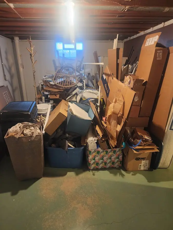 Roll-off dumpster container at job site for 15 Yard Dumpster Rental in Briar